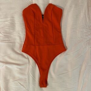 red bodysuit